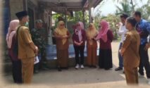 Tim Kesehatan Puskesmas Patia saat Berikan Layanan Kesehatan Kepada Warga di Desa Pasirgadung Merasakan manfaat atas akses jalan baru hasil TMMD ke 129