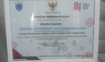 Piagam penghargaan lomba karya jurnalistik seputar kegiatan TMMD ke 129